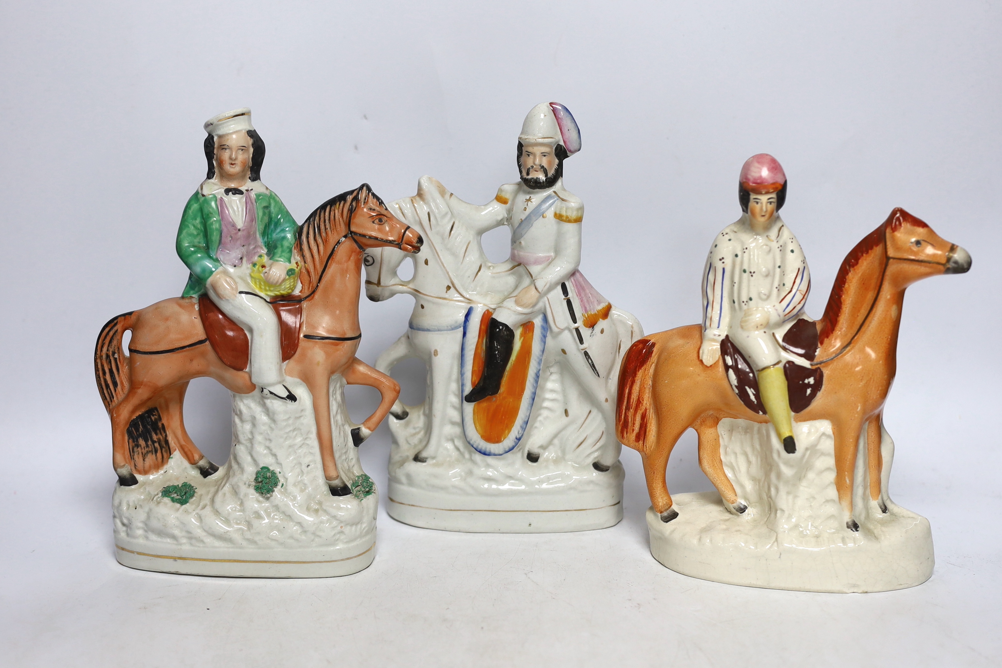 Six 19th century Staffordshire pottery equestrian groups, 25cm